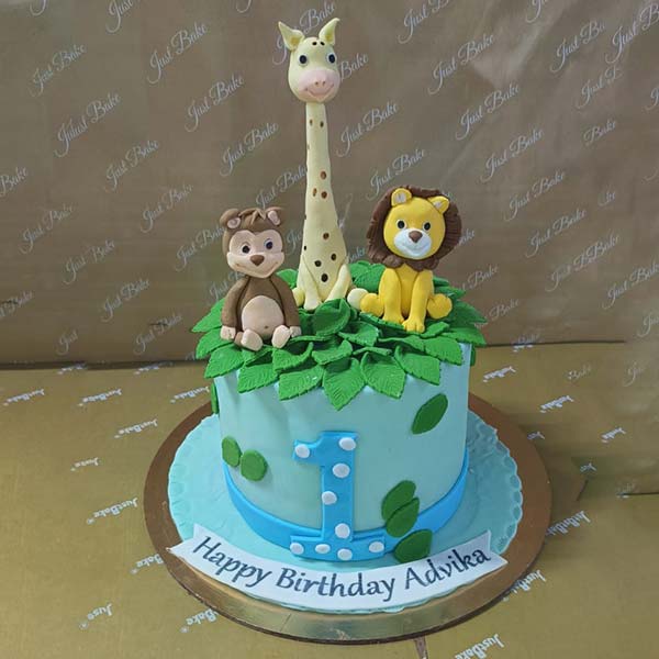 Jungle theme first birthday cake