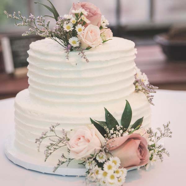 White Wedding Cake With Flowers