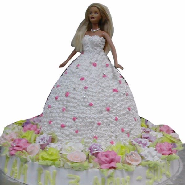 White Fluffy Gown Doll Theme Cake