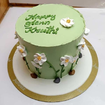 Beautiful Green Cake With White Florals